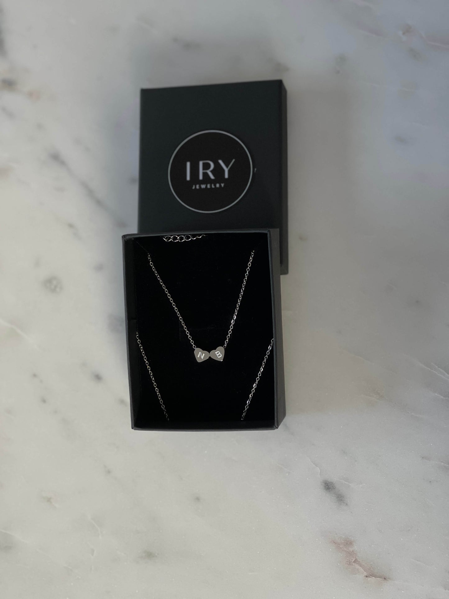 Engraved hearts necklace