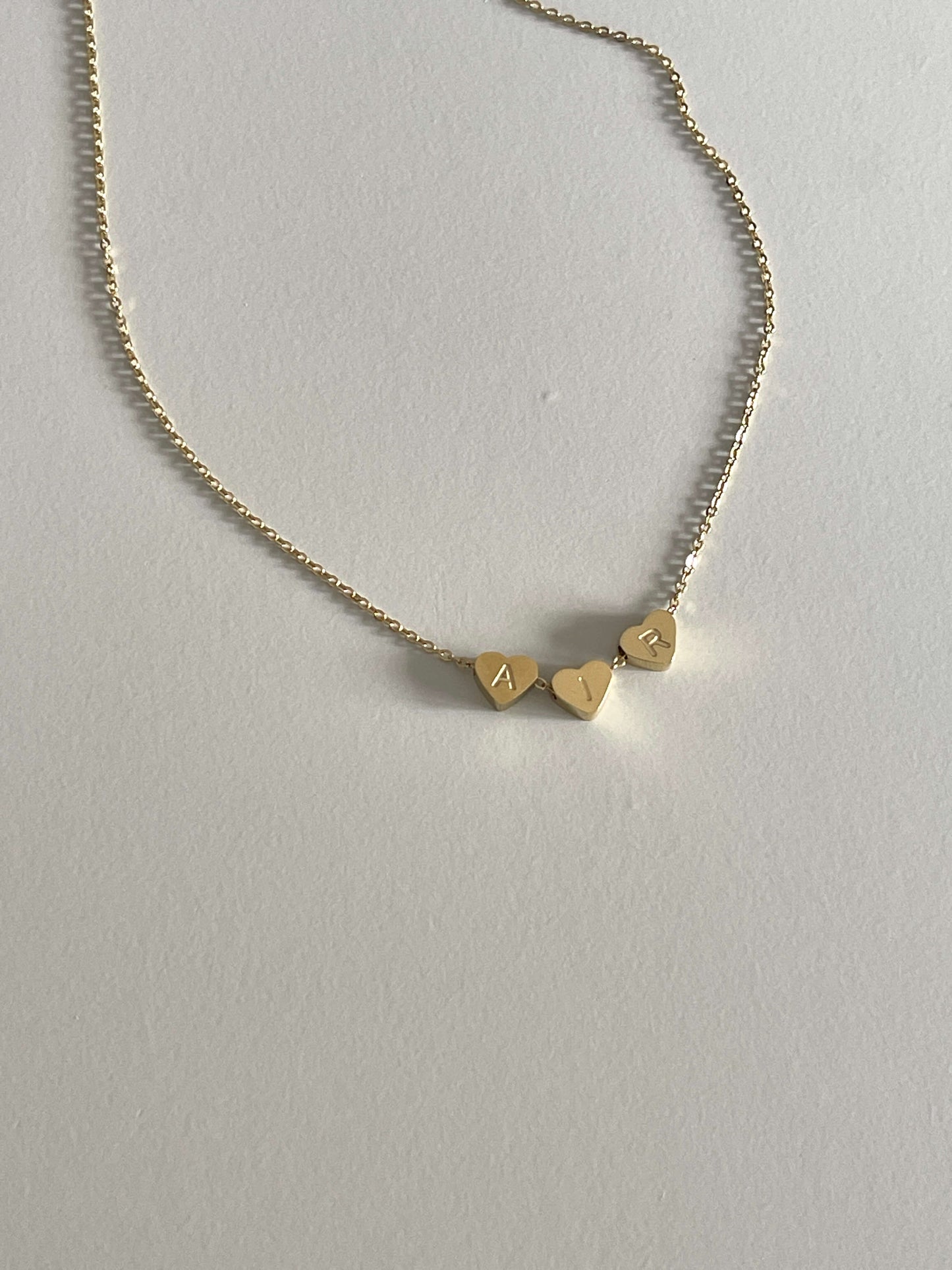 Engraved hearts necklace